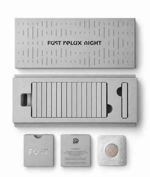 FAST Relax Night open silver box with neatly aligned tablet sleeves and blister on white background